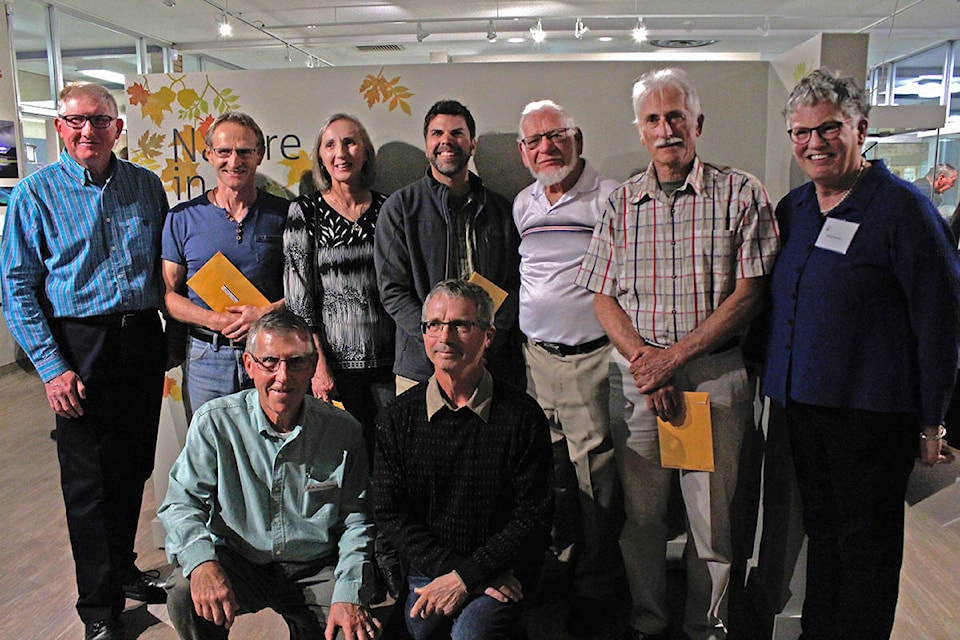 The first place and grand prize winners of the Nature in Focus photo contest pose with South Okanagan Naturalists’ Club president and vice president on Oct. 4 at the Penticton Museum & Archives. 100 photos from the contest will be on display at the museum until early December. Jordyn Thomson/Western News