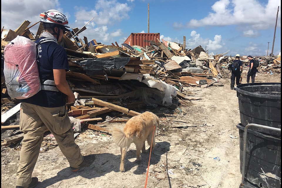 Penticton fire chief Larry Watkinson and Burnaby firefighters fly to Bahamas to help search for victims in September 2019, following destructive Hurricane Dorian. (Penticton Fire Department/Twitter)