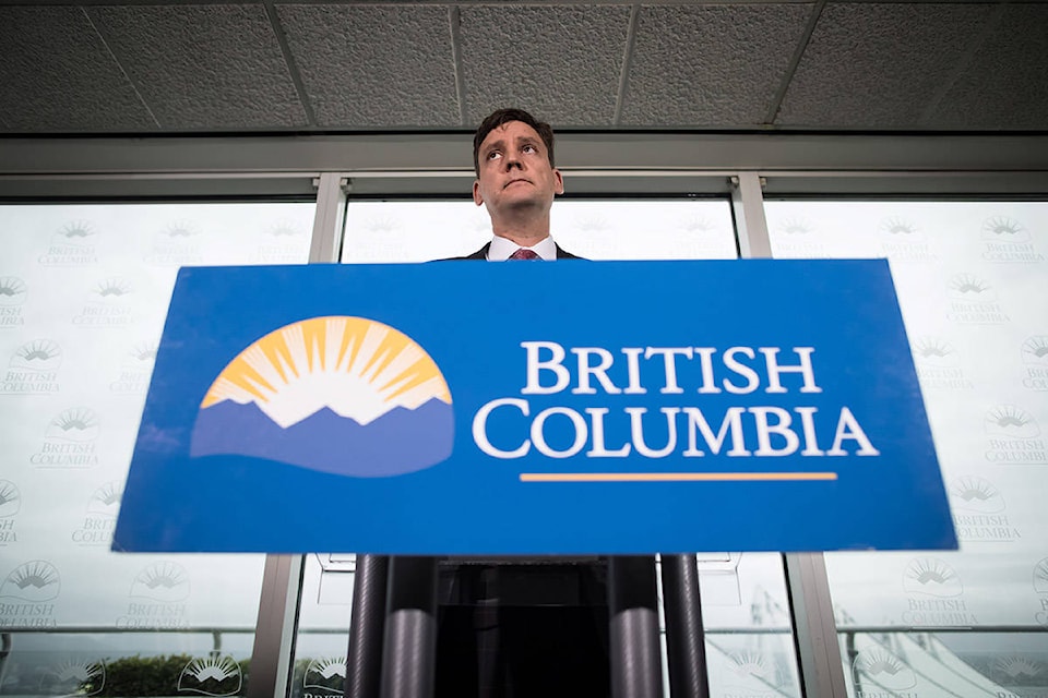 B.C. Premier David Eby announced a bell-to-bell ban on cellphones in school last month during a stop in Vancouver.  (Darryl Dyck, Canadian Press)