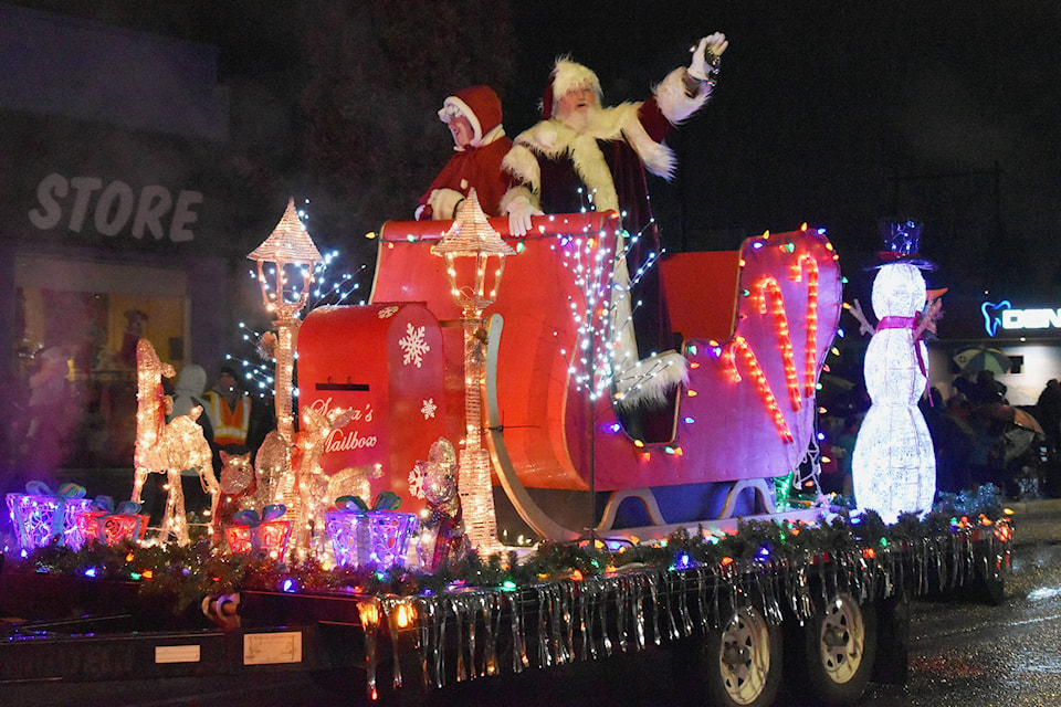 There plenty of lights to guide Santa on his way Saturday night for the annual Santa Parade in Penticton. (Brennan Phillips – Western News)