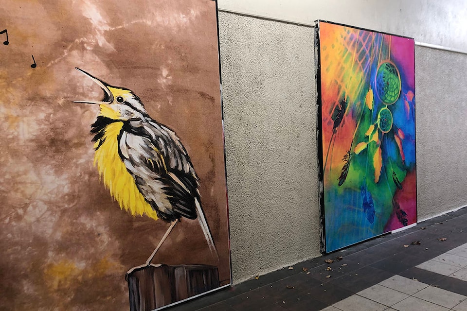 These are some of the many murals to be installed in the breezeway in the 200 block of Main St. (Monique Tamminga Western News)