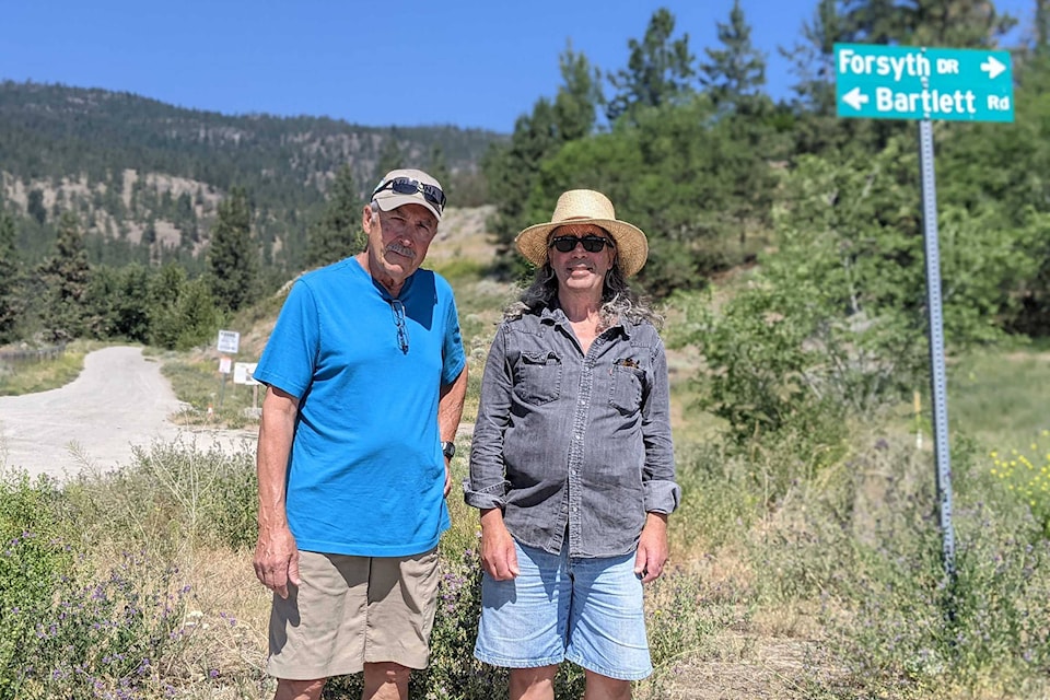 Bruce Turnbull (left) and Peter Lindelauf (right) have taken it upon themselves to ensure their small, isolated neighbourhood of Husula is prepared should a wildfire strike. (Jesse Day - Western News)