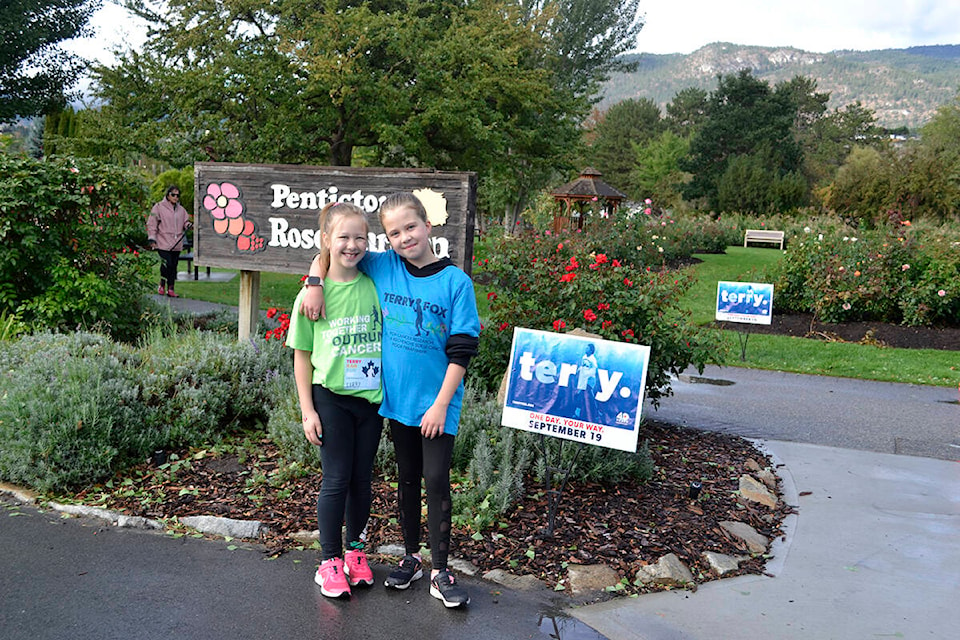 Abigail, 8, and Olivia, 9, both ran 2 km in the Penticton Terry Fox Run Sunday morning, Sept. 19. (Monique Tamminga Western News)