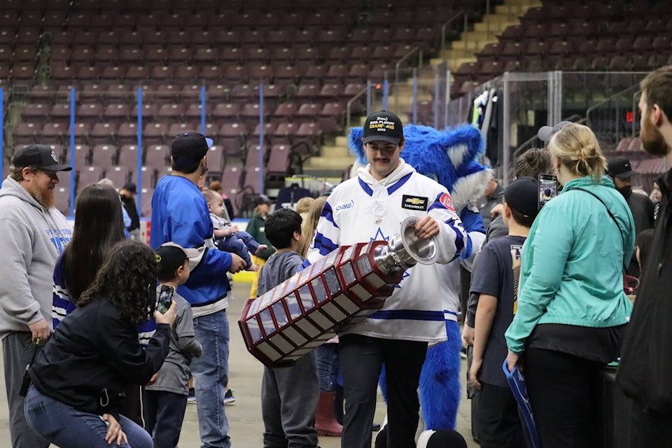 Penticton Vees captain Frank Djurasevic walking with the B.C. Hockey League’s Fred Page Cup during the team’s championship celebration Monday, May 22, at the South Okanagan Events Centre. (Photo- City of Penticton)