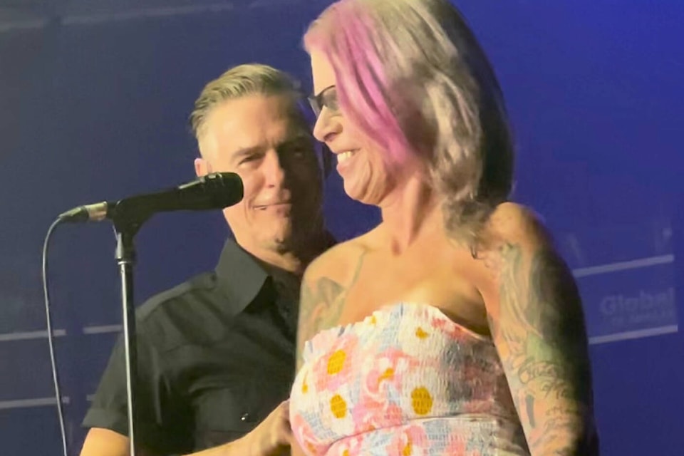 Superstar Bryan Adams made a Penticton woman’s dream come true by autographing her shoulder at the Sept. 11 concert in Penticton. She later got the signature tattooed. (Video still from Lori Capozzi)
