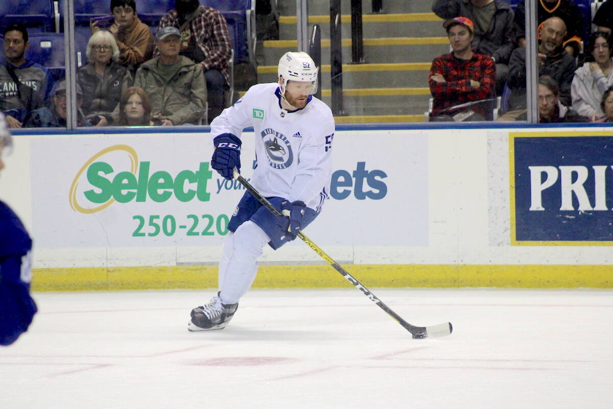 Brentwood Bays Matt Irwin skates with the puck during the Vancouver Canucks intrasquad scrimmage at the Save-On-Foods Memorial Centre during day three of their Victoria training camp on Sept. 23. (Jake Romphf/News Staff)