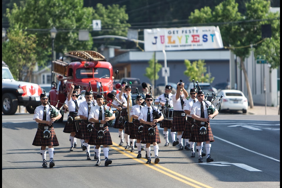 The Kimberley Pipe Band lead the annual parade at JulyFest. 