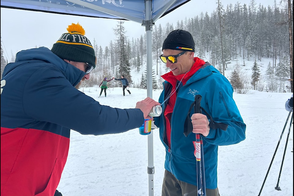 Fred Williams from the Fire Hall/Encore in Cranbrook serves up some tasty Encore Brewing beer at the second-annual Brew Ski. KNC/Submitted.