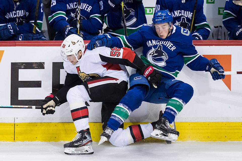 16058526_web1_190320-IFD-Canucks-Sens