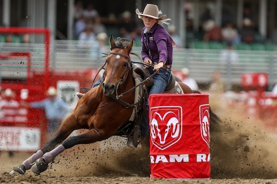 Stettler's Justine Elliot turns the barrel at Ponoka Stampede on the second day of rodeo action. Elliot's run was good enough to land her 10th spot at 17.81 seconds. There was strong Alberta representation from barrel racers with cowgirls from Carseland, Yellowhead County, Clive, Rimbey, Gleichen, and Alix landing a chance for the finals. 
(Covy Moore photo)



(Covy Moore photo)