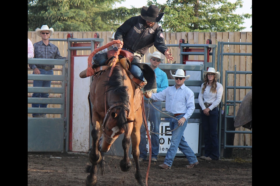 Dallas Albertson competed in saddlebronc/bareback during the ninth annual Alix C.A.R.A. Rodeo which ran Aug. 16-17.
(Mark Weber/Lacombe Express)