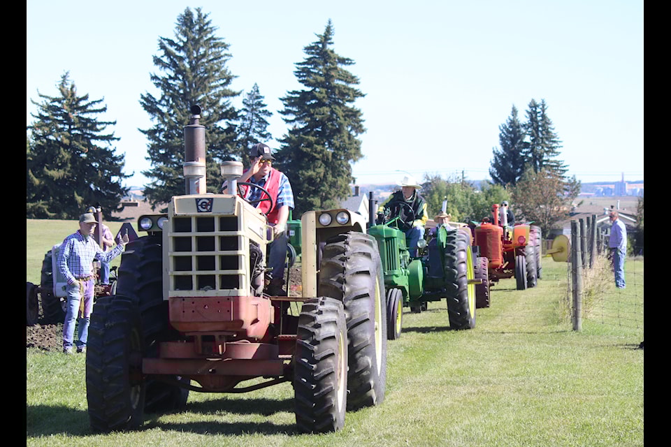 The Lacombe Vintage Machinery Club presented tractor pulls and threshing demonstrations during the Lacombe Culture and Harvest Festival on Sept. 21.
(Mark Weber/Lacombe Express)