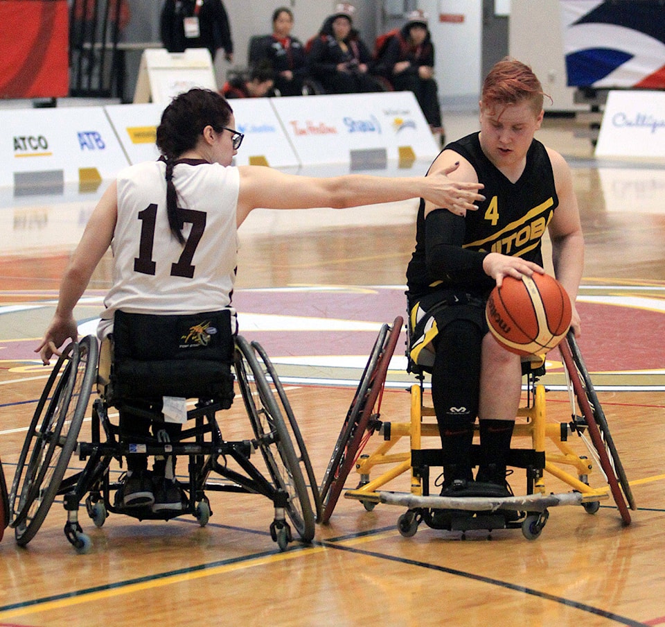 15645414_web1_190227-EXP-WheelchairBasketball_2