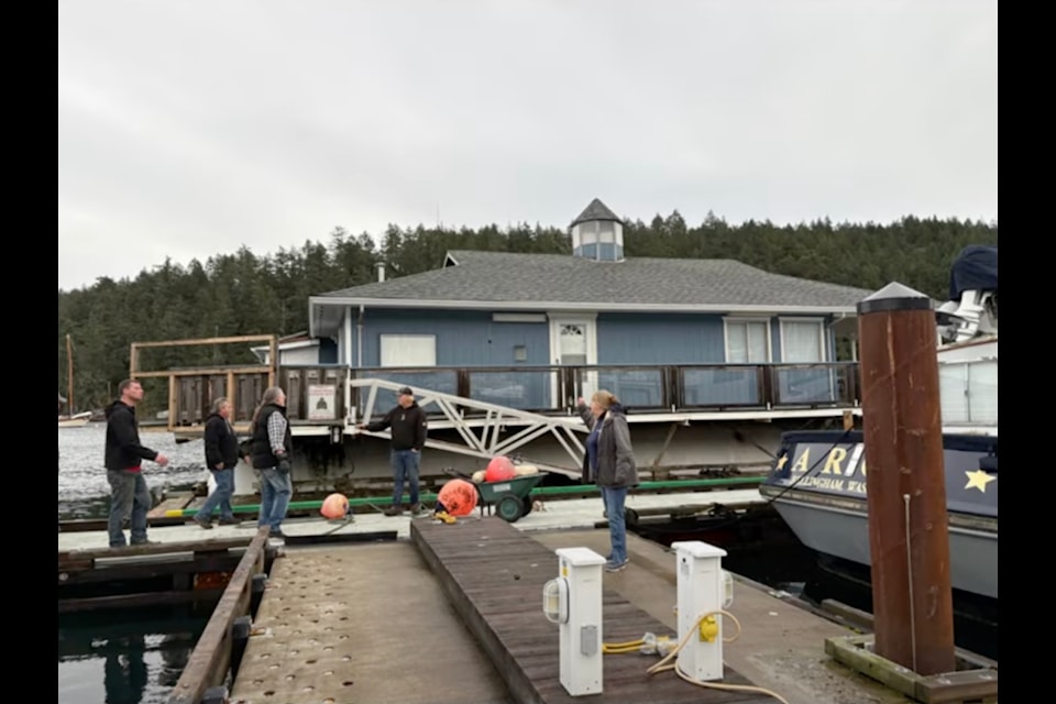 The floating clubhouse of the Ladysmith Yacht Club (LYC) embarked on a journey to its new home at the Maple Bay Marina.