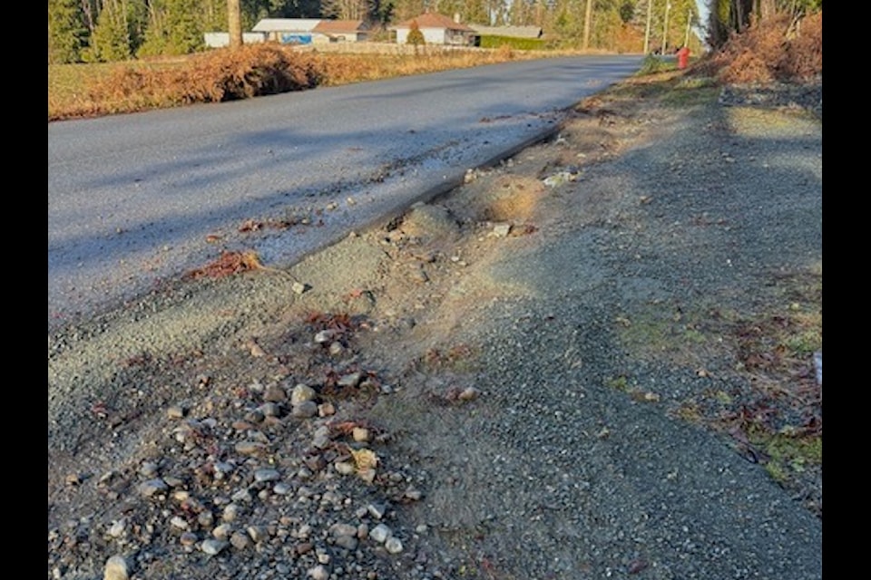 A resident’s driveway was washed out by the water after an act of vandalism in which water hydrants in Saltair were opened and left flowing on Dec. 15.