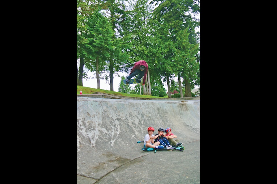 The town’s skatepark, located beside the Frank Jameson Community Centre, has seen an immense amount of activity since it was constructed more than 20 years ago. A local group of users, parents and other interested bodies have formed the Ladysmith Skatepark Collective to start the move to remake the park. The group is planning on doing some painting of the park, until all necessary funding and approvals are in place to do the major work. Pictured are Shae Mcneil, Jonathan Micheletti and Boaz Micheletti watching as Nevaen Alle-Kopas performs board tricks above them. The seams and cracks in the concrete as well as the wearing finish are evident in the photo. 
