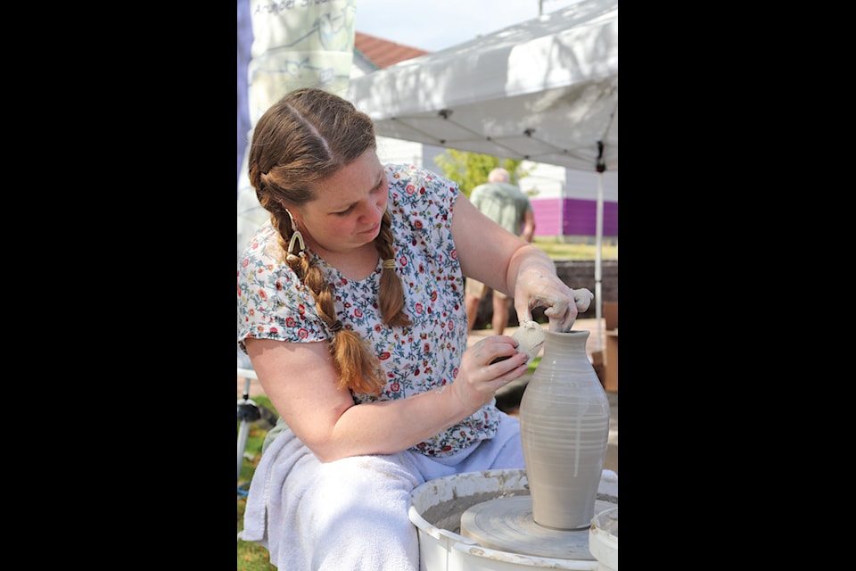 Pottery is a popular craft in the Ladysmith area and the various booths at the recent Arts on the Avenue attracted their share of spectators. Bronwyn Arundel, who is the owner of Nanaimo Ceramic Arts Studio and Gallery and a member of the Ladysmith Arts Council, gave demonstrations of the various techniques used by the individual artists.