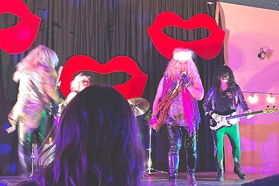 Ladysmith council member Jeff Virtanen led the Class of 88 in a performance of Poison’s hit song, 'Nothing But a Good Time'.