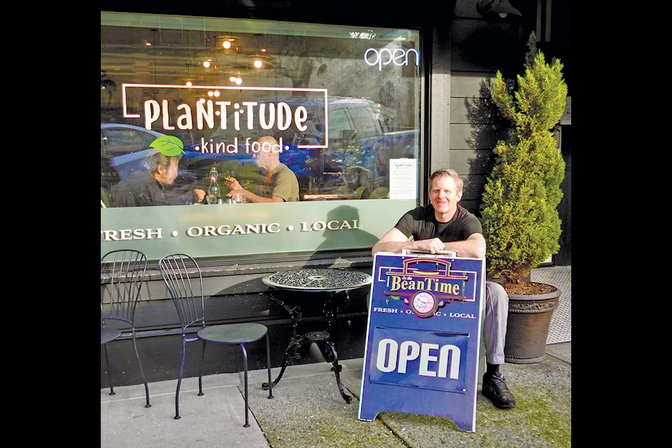 Campbell McIntyre, the owner/operator of In the Beantime along with his partner Kristy, outside the cafe's new shared space with Plantitude in Ladysmith.