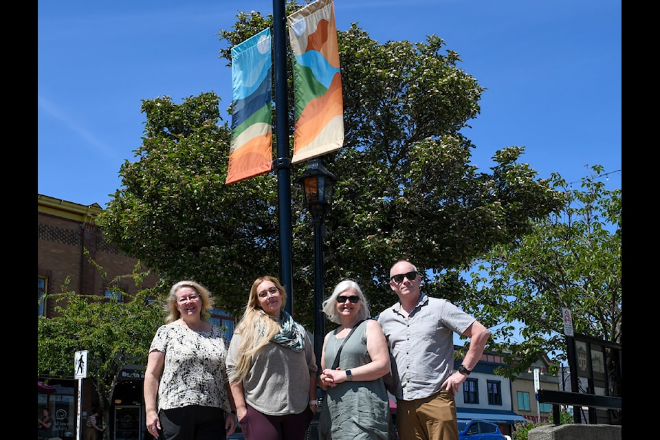 Mayor Deena Beeston (left) with Community Banner Program winner Natasha Bartlett, Councillor Tricia McKay, and the Town’s Arts, Culture & Events Coordinator, Don Stewart.
