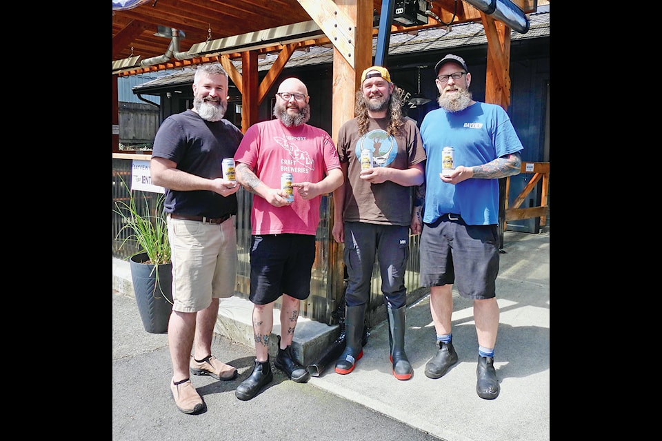Co-owners Rod Alsop, Jonny Ludtke, Alfred Elviss and Geoff Alsop celebrate Bayview Brewing's third birthday with their first canned product, Famous Ladysmith Blonde. 