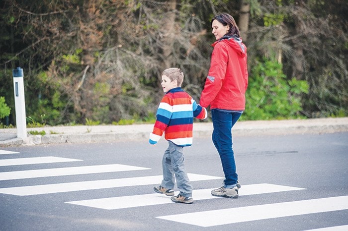 Mother and Son crossing the Street