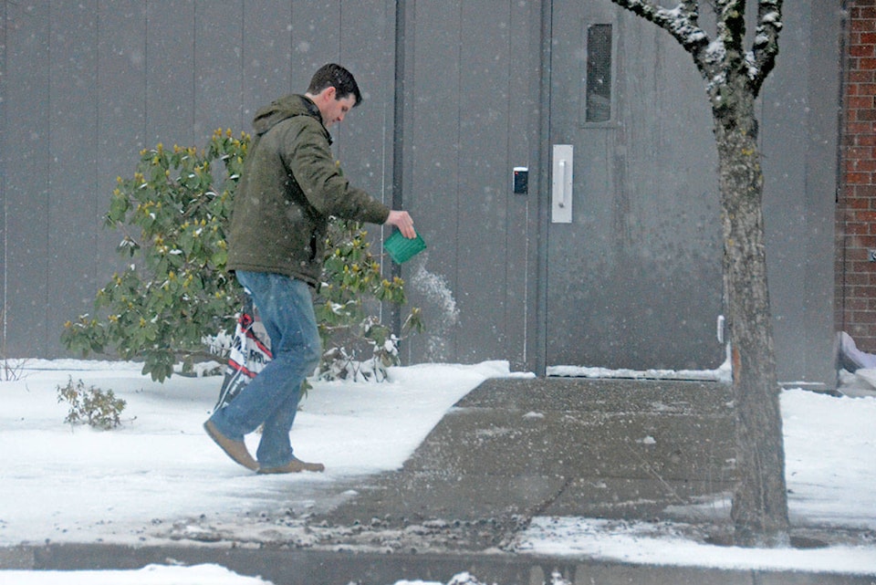 10151033_web1_Salt-sidewalk-snow