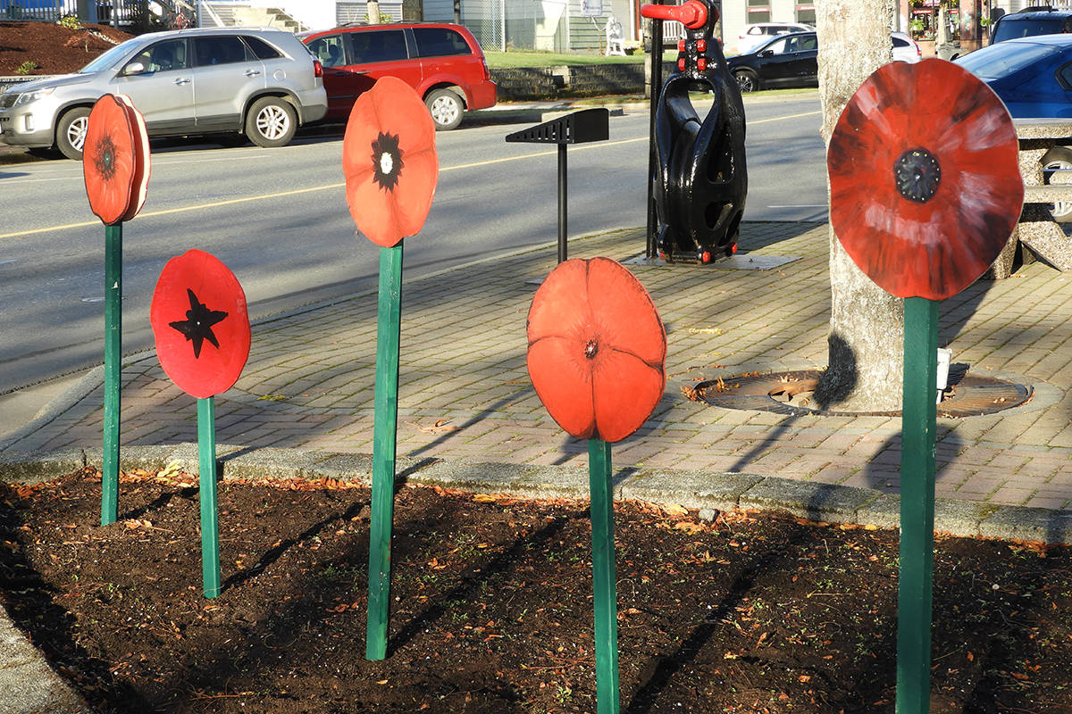 The poppies have been put up in flower beds along 1st Avenue. (Submitted photo)
