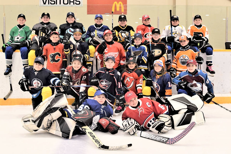 Some Williams Lake U11 hockey players enjoyed a game wearing NHL jerseys at the Cariboo Memorial Recreation Complex. Back row from left, Callum Peterson - Dallas, Kalen Surette - Vegas, Mike Palmantier - Seattle, Kloey Spence - Vancouver, Tryan Rivet - Pittsburgh, Gavin Francis - Carolina, Cole Olsen - Nashville, Henry Larsson-Allan - Philadelphia, third= row from left, Deklan Fraser - Calgary, Landon Galisky - Buffalo, Matthew Boyd-Gilbert - Detroit, Easton Neuner - St. Louis, Jackson Sache - Anaheim, Flynn Kinley - Edmonton, Lane Judd - Winnipeg, second row from left, Carter McLennan - Arizona, Luc Harrison - Columbus, Sophie Johnson - New Jersey, Jayda Frizzi - New York Islanders, Parker Cook - Colorado, front row from left Zion Campbell - Toronto and Wade Hansen - Montreal. (Clay Palmantier photo)