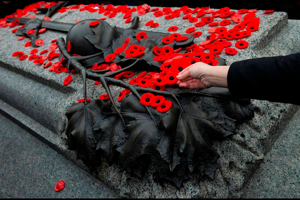 A poppy is placed on the Tomb of The Unknown Soldier following a Remembrance Day ceremony at the National War Memorial in Ottawa on Monday Nov. 11, 2019. THE CANADIAN PRESS/Sean Kilpatrick