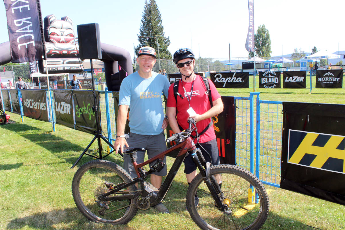 The founders of the BC Bike Race, Andreas Hestler, left, and Dean Payne in Crofton Monday for the start of this years event. (Photo by Don Bodger)