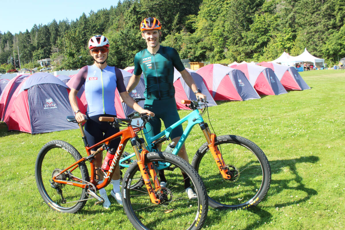 An impressive field of riders for the BC Bike Race includes: Katerina Nash, left, from California and Geoff Kabush of Squamish, who grew up in Courtenay. (Photo by Don Bodger)