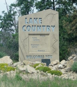 51137winfieldLake-Country-Entrance-Sign-on-hwy-267x300