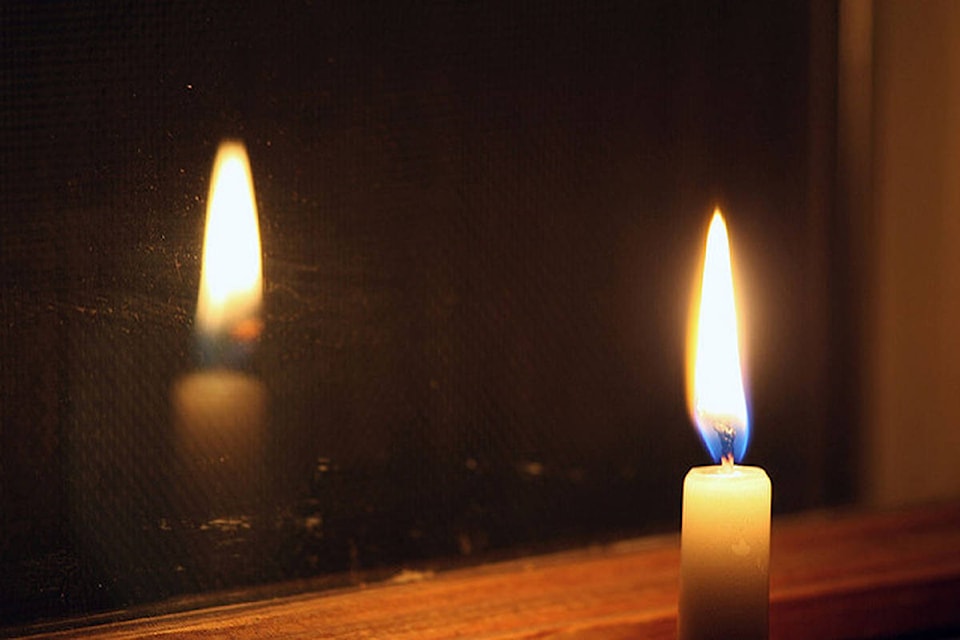 13460809_web1_180912-KCN-candle-in-the-window-for-Christmas-2
