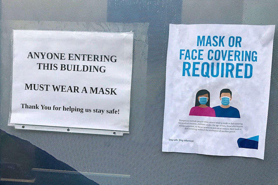 23488804_web1_copy_201202-SAA-business-mask-signs_1