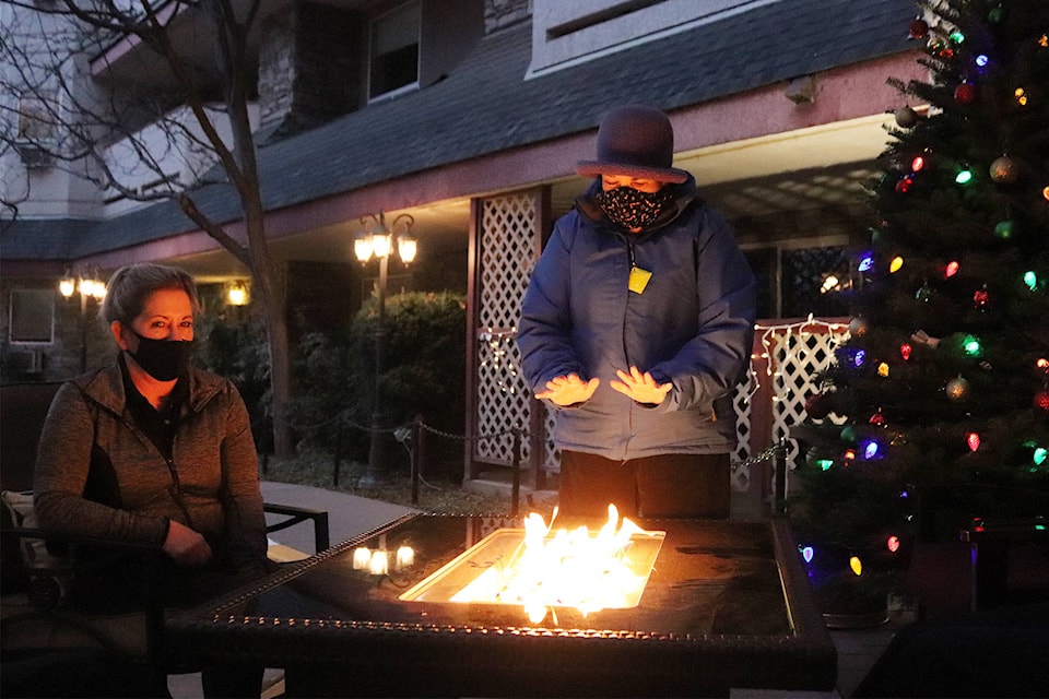 Residents at Vernon’s Canterbury Court enjoyed a new outdoor, holiday-themed space where they could safely socialize within their residential bubble amid the pandemic Saturday, Dec. 12, 2020. (Brendan Shykora - Morning Star)