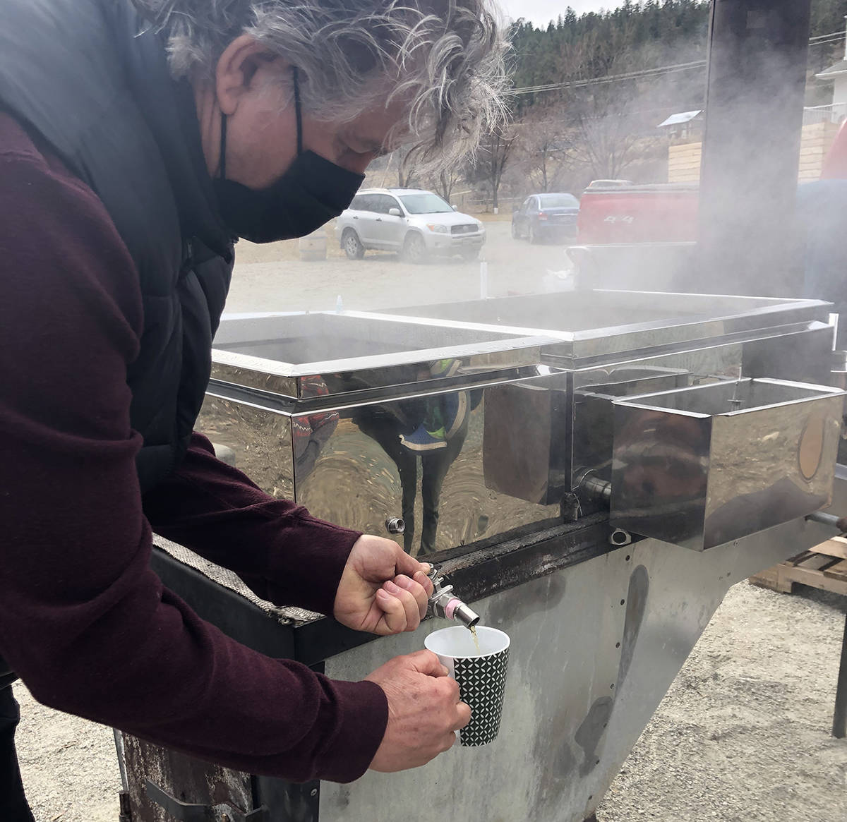 Roch Fortin, owner of the Okanagans only maple syrup store Maple Roch in Summerland, offers small sweet samples of maple syrup at Nomad Cider. (Monique Tamminga)