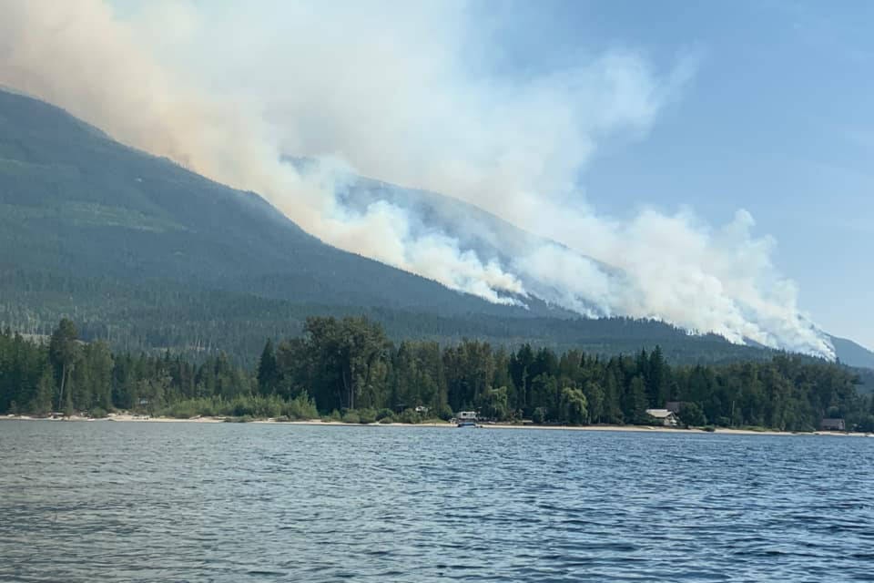 The Bunting Road fire burning above a number of cabins on Mabel Lake, where residents remain on evacuation alert. (Randy Smith photo)