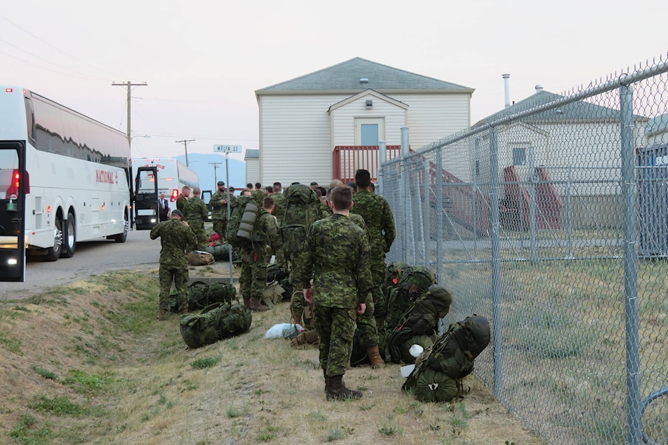 26288513_web1_210729-VMS-cdn-forces-firehelp-CAF_1