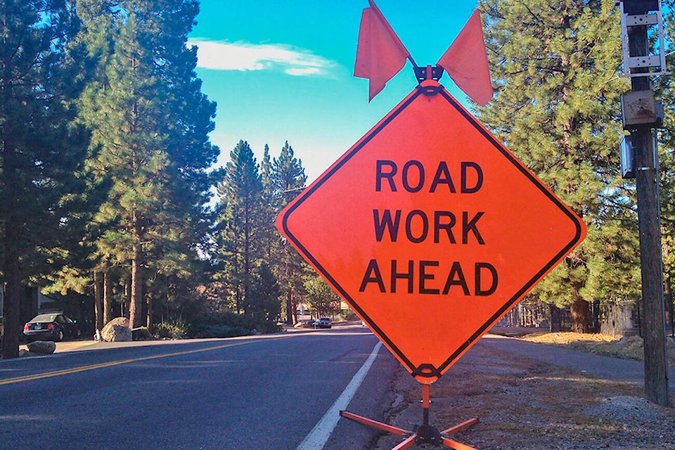 26633599_web1_T-Road-Work-sign