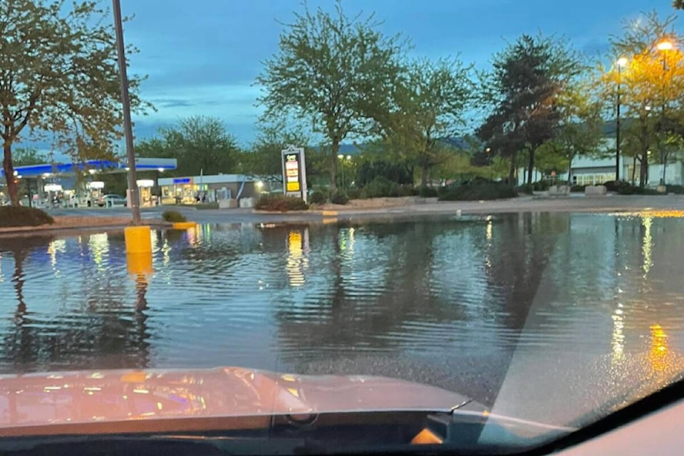 Flooding at business complex off Highway 97. (Facebook)