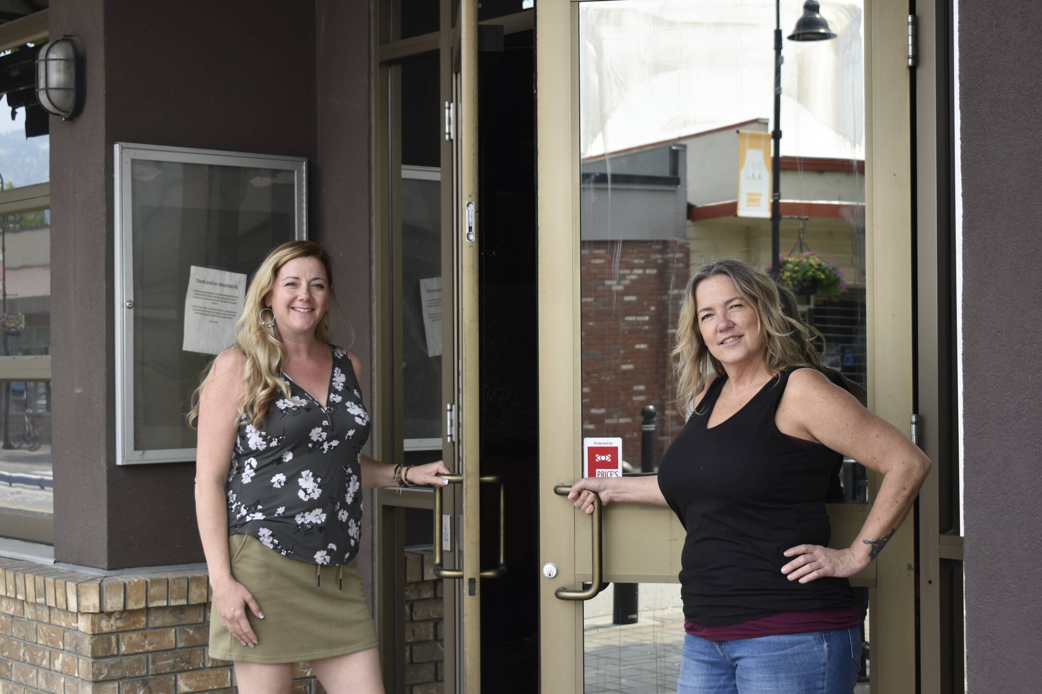 Kori Iceton, left, and Loree Hubner outside The Hub on Martin before it opens its doors to the public in June. (Logan Lockhart- Western News)
