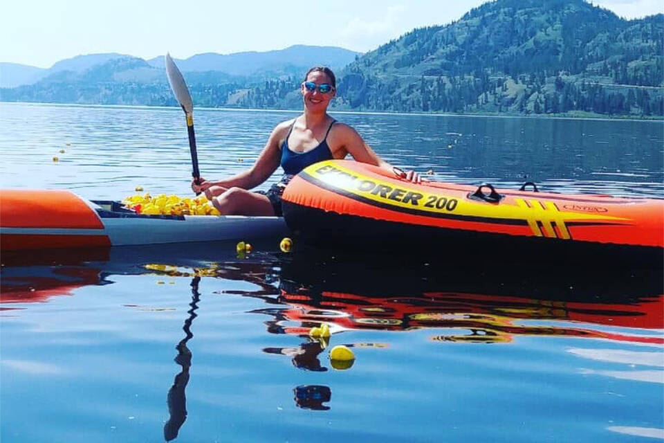 Penticton Paddle Sports volunteered to help collect the 2,000 rubber ducks that escaped into Skaha Lake on Saturday morning. Almost all have been collected but Graphically Hip is offering a reward for any found. (Penticton Paddle Sports Facebook)