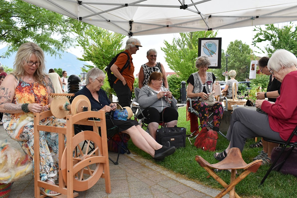 Knitters gathered at Ross Street Plaza for Worldwide Knit in Public Day, encouraging Farmers Market shoppers to ask questions and learn about knitting and crafts. (Rebecca Willson- Salmon Arm Observer)