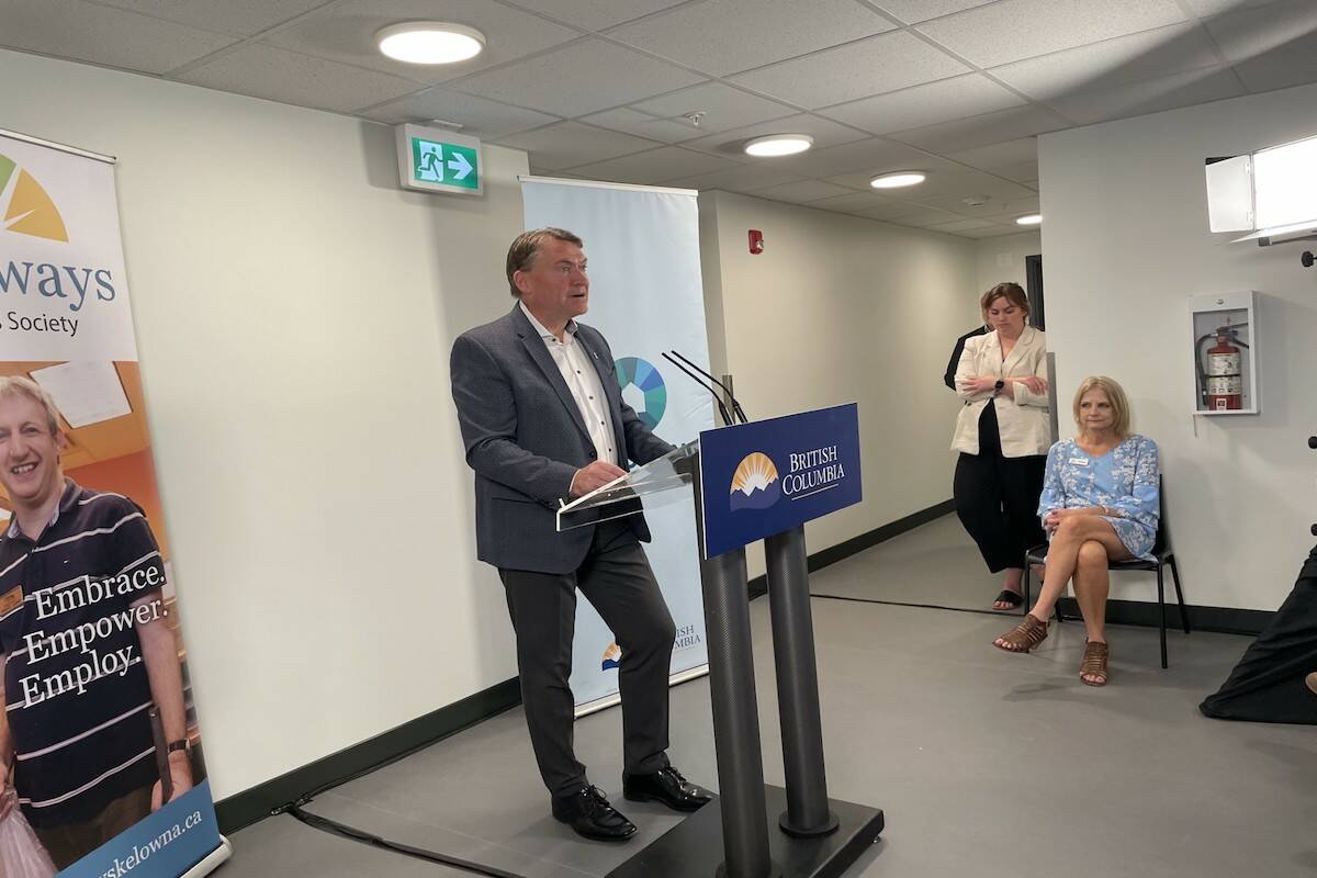 Kelowna Mayor Tom Dyas speaks during a media event at Hadgraft Wilson Place, a recently opened apartment building that provides homes for seniors, people with low to moderate incomes and people living with disabilities. (Gary Barnes/Capital News)