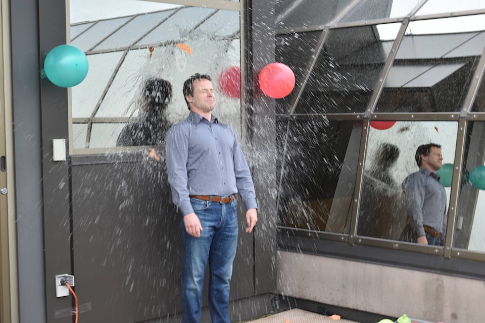 Law firm Pushor Mitchell teamed up with the Boys and Girls Club of the Okanagan to raise money with a ‘lawyer water balloon toss’ on Friday, June 16. (Jordy Cunningham/Capital News)