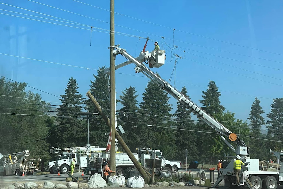 A new power pole was needed to be erected after a vehicle took out the pole on Kalamalka Road early July 4. (Alfred Pryce photo)