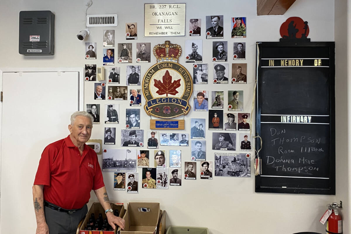 Ed Findlater, the former president of the Okanagan Falls Legion, has seen many changes at the legion since becoming a member in 1983. He reflected on the Legions history while referencing his friends on the wall. (Logan Lockhart- Western News)