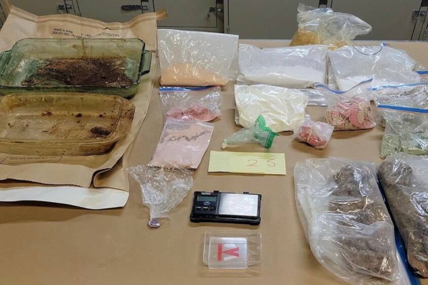A year-long drug investigation by Kelowna RCMP led to the seizure of handguns, and drugs in B.C. and Alta. (Photo Kelowna RCMP)