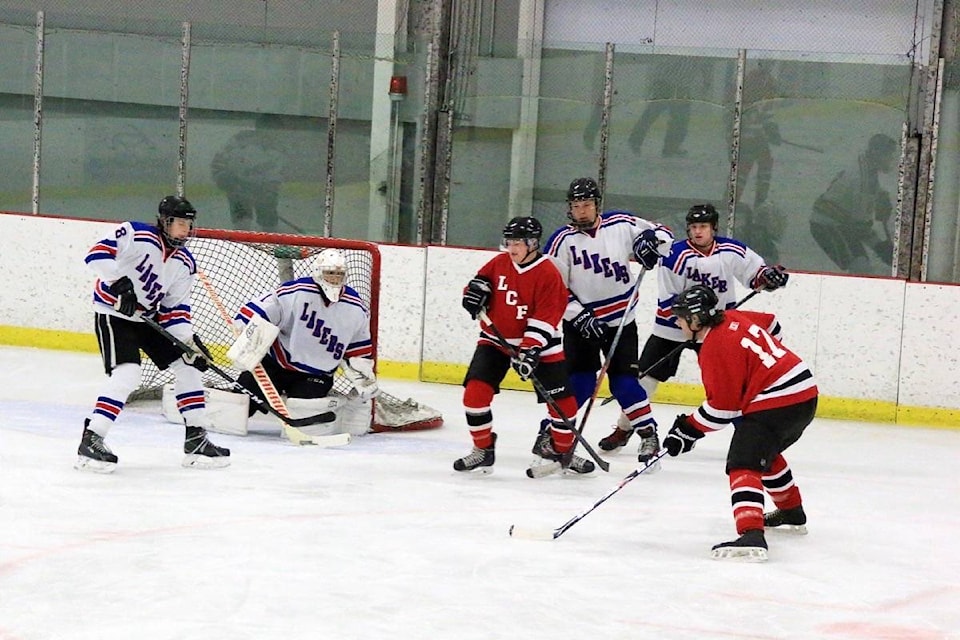 web1_170503-LCO-foodbank-hockey-game_1